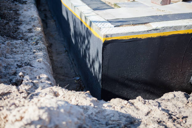 Professional Emergency Waterproofing technician working in Franklin, NC